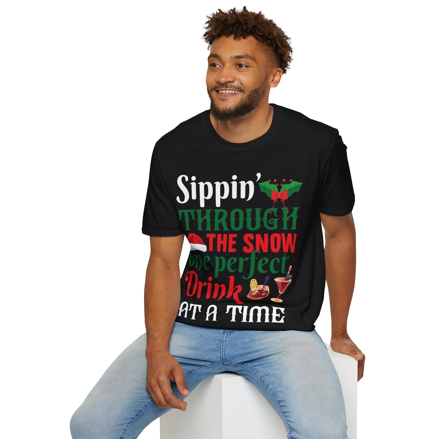 "Sippin' Through the Snow, One Perfect Drink at a Time" Unisex Softstyle T-Shirt